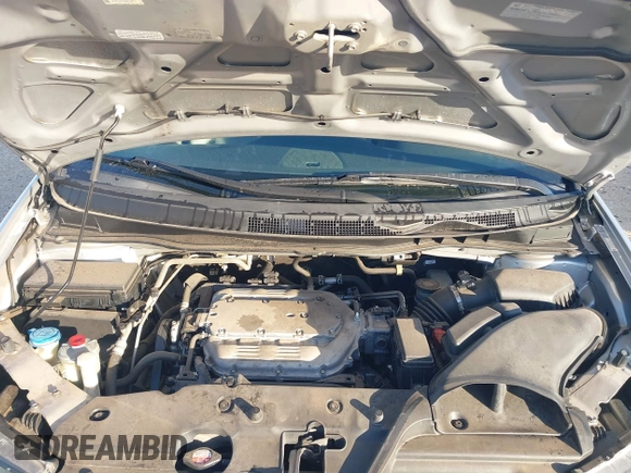 2014 Honda Odyssey Touring with VIN 5FNRL5H97EB094353, listed as a IAAI auction lot 41701712 with 141,228 mi miles and . Bid and sale history available at DreamBid. Image 10.