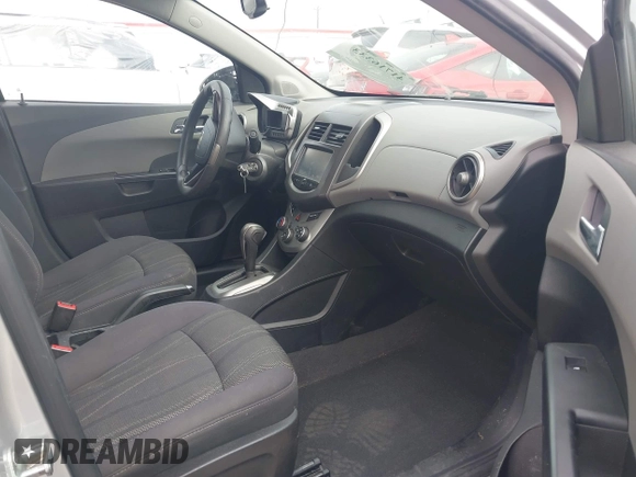 2015 Chevrolet Sonic LT with VIN 1G1JC5SH5F4157626, listed as a IAAI auction lot 41716333 with 131,866 mi miles and . Bid and sale history available at DreamBid. Image 5.