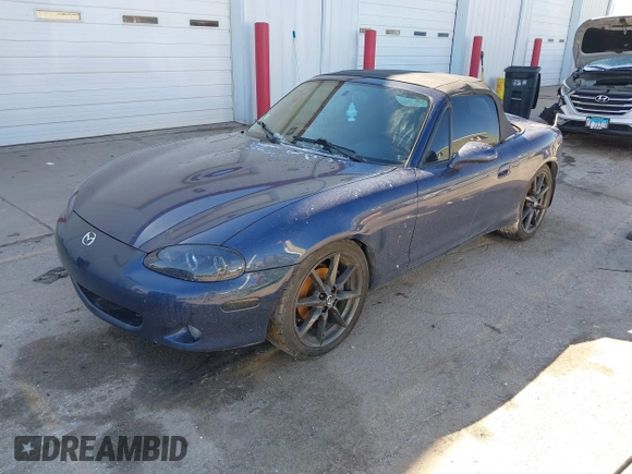 2002 Mazda MX-5 Miata Cloth z VIN JM1NB353920234533, wystawiony jako IAAI lot #41735487 z przebiegiem 112 661 mil mil oraz . Historia ofert i sprzedaży dostępna na DreamBid. Obrazek 17.
