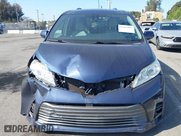 2019 Toyota Sienna XLE with VIN 5TDDZ3DC9KS220976, listed as a IAAI auction lot 41667049 with 92,568 mi miles and . Bid and sale history available at DreamBid. Image 12.