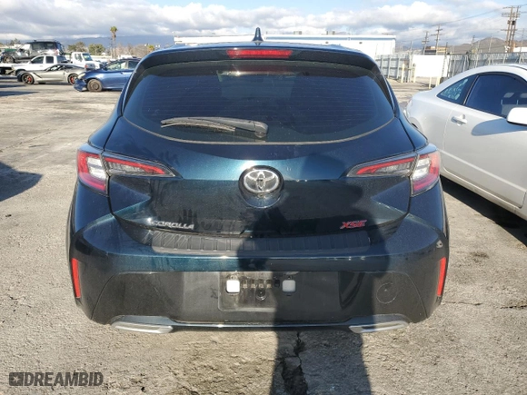 2021 Toyota Corolla Hatchback XSE with VIN JTNC4MBEXM3137464, listed as a Copart auction lot 44084395 with 39,569 mi miles and Salvage Title. Bid and sale history available at carsss.com. Image 6.