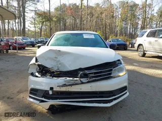 2016 Volkswagen Jetta Sedan 1.4T SE w/Connectivity with VIN 3VWD67AJ8GM409674, listed as a IAAI auction lot 41835611 with 154,602 mi miles. Bid and sale history available at carsss.com. Image 6.