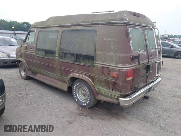 1989 Chevrolet Chevy Van z VIN 1GBEG25K5K7184695, wystawiony jako IAAI lot #42432728 z przebiegiem 945 928 mil mil oraz . Historia ofert i sprzedaży dostępna na DreamBid. Obrazek 3.