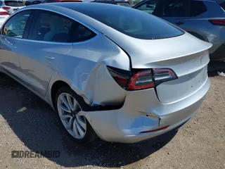 2018 Tesla Model 3 Long Range Battery with VIN 5YJ3E1EB5JF100578, listed as a IAAI auction lot 41959766 with 57,931 mi miles and . Bid and sale history available at DreamBid. Image 6.