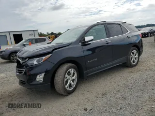 2020 Chevrolet Equinox Premier z VIN 2GNAXXEV2L6215315, wystawiony jako Copart lot #56130795 z przebiegiem 74 316 mil mil oraz Szkoda całkowita • Salvage title. Historia ofert i sprzedaży dostępna na DreamBid. Obrazek 1.