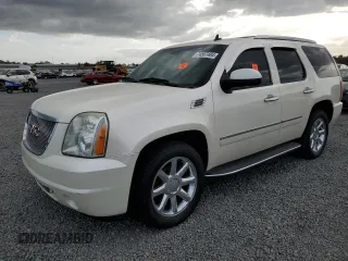 2012 GMC Yukon Denali with VIN 1GKS1EEF2CR293128, listed as a Copart auction lot 74567484 with 0 mi miles and Salvage Title. Bid and sale history available at carsss.com. Image 1.