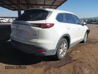 2016 Mazda CX-9 Sport with VIN JM3TCBBY0G0117159, listed as a IAAI auction lot 41302108 with 136,495 mi miles. Bid and sale history available at carsss.com. Image 4.