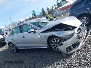 2020 Audi A4 Premium z VIN WAUGMAF45LA067448, wystawiony jako IAAI lot #41712095 z przebiegiem 66 321 mil mil oraz . Historia ofert i sprzedaży dostępna na DreamBid. Obrazek 13.