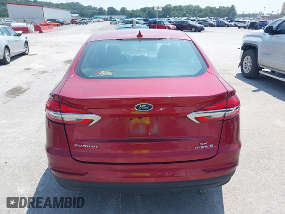 2019 Ford Fusion Hybrid SE with VIN 3FA6P0LU6KR243678, listed as a IAAI auction lot 40004890 with 138,533 mi miles. Bid and sale history available at carsss.com. Image 16.