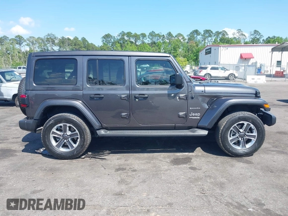 2022 Jeep Wrangler Unlimited Sahara with VIN 1C4HJXEN2NW194502, listed as a IAAI auction lot 42002455 with 34,861 mi miles and . Bid and sale history available at DreamBid. Image 13.