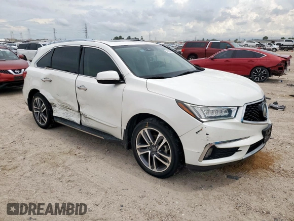 2017 Acura MDX Advance with VIN 5FRYD3H83HB010049, listed as a Copart auction lot 62385925 with 121,312 mi miles and Salvage title. Bid and sale history available at DreamBid. Image 4.