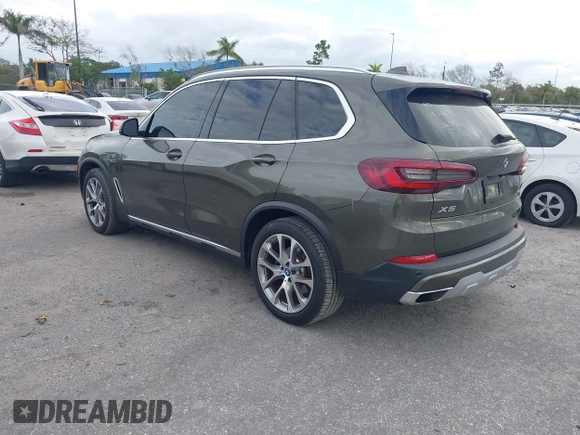 2022 BMW X5 xDrive45e z VIN 5UXTA6C00N9L06383, wystawiony jako IAAI lot #38552162 z przebiegiem 19 592 mil mil oraz . Historia ofert i sprzedaży dostępna na DreamBid. Obrazek 3.