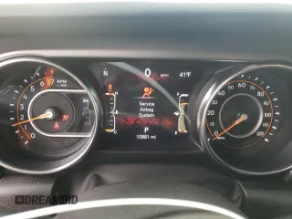 2023 Jeep Gladiator Freedom с VIN 1C6HJTAG3PL579160, выставлен на аукционе Copart как лот 46909635 с пробегом 10 081 миль миль и Списание • Salvage title. История ставок и продаж доступна на DreamBid. Изображение 9.