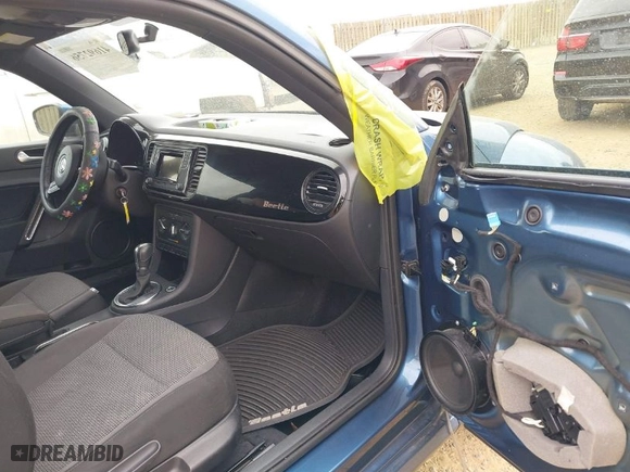 2019 Volkswagen Beetle S with VIN 3VWFD7AT8KM708865, listed as a IAAI auction lot 41692756 with 35,070 mi miles. Bid and sale history available at carsss.com. Image 5.