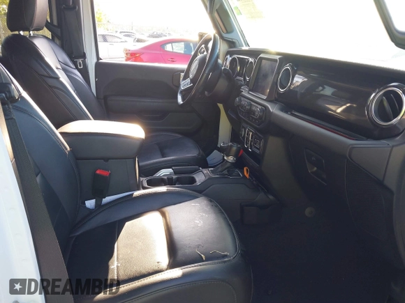 2020 Jeep Wrangler Unlimited Sahara High Altitude with VIN 1C4HJXEG7LW259911, listed as a IAAI auction lot 41786013 with 47,936 mi miles and . Bid and sale history available at DreamBid. Image 5.