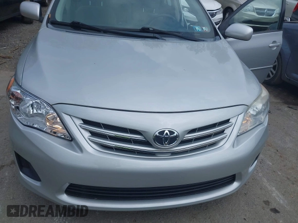 2013 Toyota Corolla L with VIN 2T1BU4EEXDC052854, listed as a IAAI auction lot 42230118 with 156,120 mi miles and . Bid and sale history available at DreamBid. Image 21.