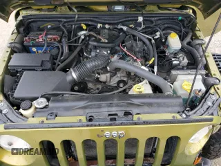 2008 Jeep Wrangler Rubicon z VIN 1J8GA69138L533859, wystawiony jako Copart lot #54202865 z przebiegiem 75 742 mil mil oraz Szkoda całkowita • Salvage title. Historia ofert i sprzedaży dostępna na DreamBid. Obrazek 12.