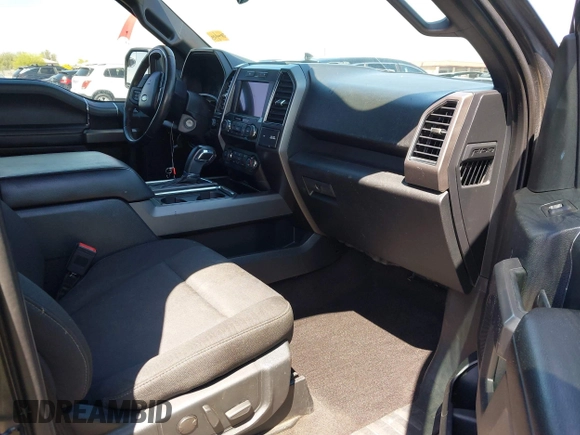 2019 Ford F-150 XL with VIN 1FTEW1C44KKE81550, listed as a IAAI auction lot 42012568 with 53,978 mi miles and . Bid and sale history available at carsss.com. Image 5.