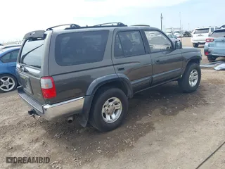 1998 Toyota 4Runner with VIN JT3GN87R9W0059225, listed as a IAAI auction lot 41669661 with 241,986 mi miles. Bid and sale history available at carsss.com. Image 4.