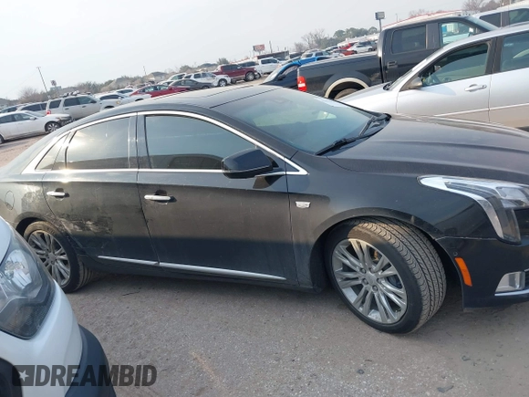 2019 Cadillac XTS Luxury with VIN 2G61M5S38K9100792, listed as a IAAI auction lot 41676187 with 103,056 mi miles and . Bid and sale history available at DreamBid. Image 13.