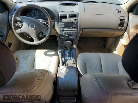 2000 Nissan Maxima GXE z VIN JN1CA31D0YT712485, wystawiony jako Copart lot #54956875 z przebiegiem 187 942 mil mil oraz Czysty tytuł • Clean title. Historia ofert i sprzedaży dostępna na DreamBid. Obrazek 8.