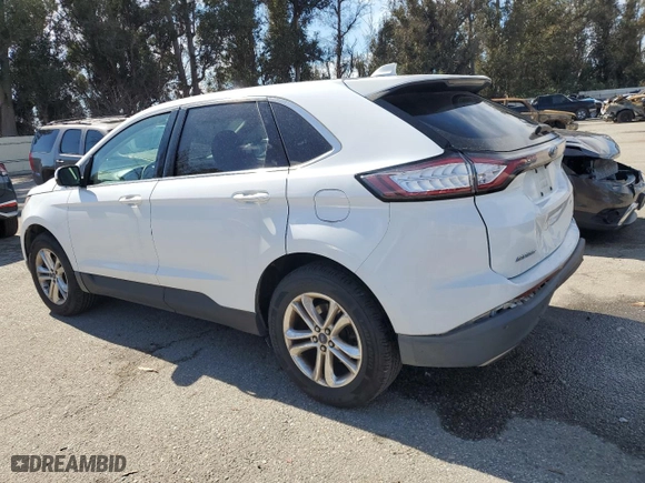 2015 Ford Edge SEL with VIN 2FMTK3J99FBB67465, listed as a Copart auction lot 48989905 with 147,840 mi miles and Salvage Title. Bid and sale history available at carsss.com. Image 2.