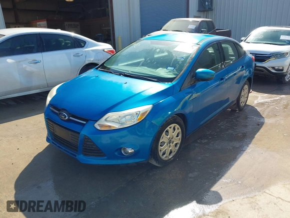 2012 Ford Focus SE with VIN 1FAHP3F24CL415176, listed as a IAAI auction lot 41993864 with 103,805 mi miles. Bid and sale history available at carsss.com. Image 2.