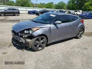 2016 Hyundai Veloster z VIN KMHTC6AD4GU273160, wystawiony jako Copart lot #52107985 z przebiegiem 120 884 mil mil oraz Szkody całkowita. Historia ofert i sprzedaży dostępna na DreamBid. Obrazek 1.