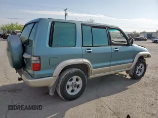 2002 Isuzu Trooper S z VIN JACDJ58X627J08662, wystawiony jako Copart lot #58969555 z przebiegiem 219 492 mil mil oraz Tytuł czysty. Historia ofert i sprzedaży dostępna na DreamBid. Obrazek 3.