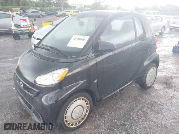 2013 Smart fortwo Pure с VIN WMEEJ3BA3DK682782, выставлен на аукционе IAAI как лот 42728005 с пробегом Не указан миль и . История ставок и продаж доступна на DreamBid. Изображение 2.