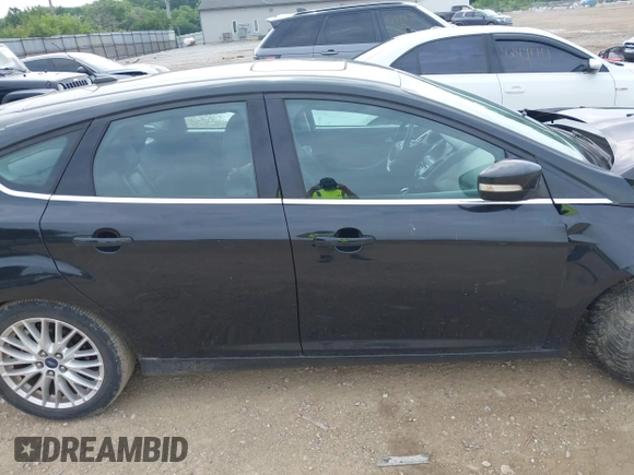 2014 Ford Focus Titanium with VIN 1FADP3N25EL194433, listed as a IAAI auction lot 42512912 with 105,355 mi miles and . Bid and sale history available at DreamBid. Image 13.