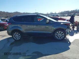 2017 Ford Escape Titanium with VIN 1FMCU0J92HUA26226, listed as a IAAI auction lot 41423259 with 111,076 mi miles. Bid and sale history available at carsss.com. Image 13.
