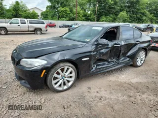 2013 BMW 5 Series 550i xDrive with VIN WBAFU9C55DDY72065, listed as a Copart auction lot 63023675 with 117,592 mi miles and Salvage title. Bid and sale history available at DreamBid. Image 1.