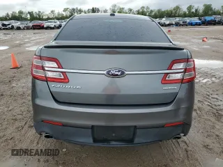 2014 Ford Taurus SE z VIN 1FAHP2D86EG143517, wystawiony jako Copart lot #51066975 z przebiegiem 134 892 mil mil oraz Szkoda całkowita • Salvage title. Historia ofert i sprzedaży dostępna na DreamBid. Obrazek 6.