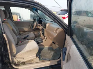 2000 Isuzu Rodeo S with VIN 4S2CK58W0Y4342408, listed as a IAAI auction lot 41659468 with 173,096 mi miles. Bid and sale history available at carsss.com. Image 5.