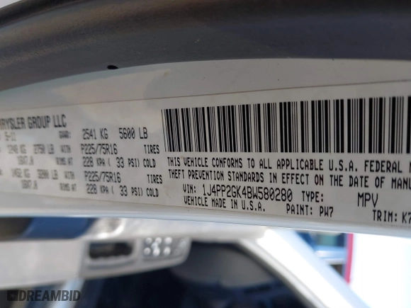 2011 Jeep Liberty Sport with VIN 1J4PP2GK4BW580280, listed as a IAAI auction lot 41482961 with 165,130 mi miles. Bid and sale history available at carsss.com. Image 9.
