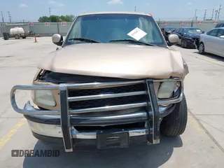 1997 Ford F-150 with VIN 1FTDX1769VNB04591, listed as a IAAI auction lot 42318471 with 202,860 mi miles and . Bid and sale history available at DreamBid. Image 12.