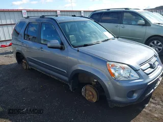 2006 Honda CR-V EX SE z VIN JHLRD78996C038036, wystawiony jako IAAI lot #42283195 z przebiegiem 149 685 mil mil oraz . Historia ofert i sprzedaży dostępna na DreamBid. Obrazek 1.