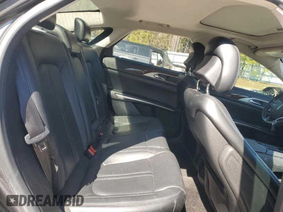 2015 Lincoln MKZ Hybrid z VIN 3LN6L2LU3FR617781, wystawiony jako Copart lot #46865265 z przebiegiem 182 895 mil mil oraz Szkoda całkowita • Salvage title. Historia ofert i sprzedaży dostępna na DreamBid. Obrazek 10.