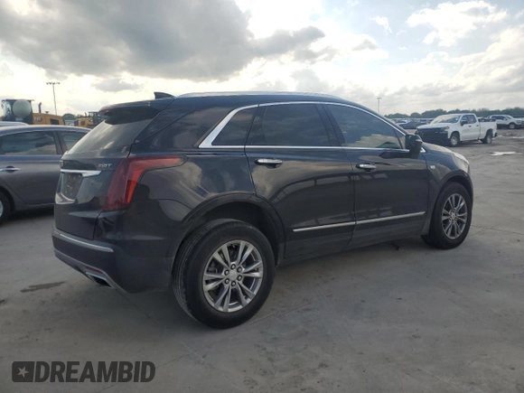 2021 Cadillac XT5 FWD Premium Luxury z VIN 1GYKNCR41MZ174477, wystawiony jako Copart lot #54335615 z przebiegiem 39 158 mil mil oraz Szkoda całkowita • Salvage title. Historia ofert i sprzedaży dostępna na DreamBid. Obrazek 3.