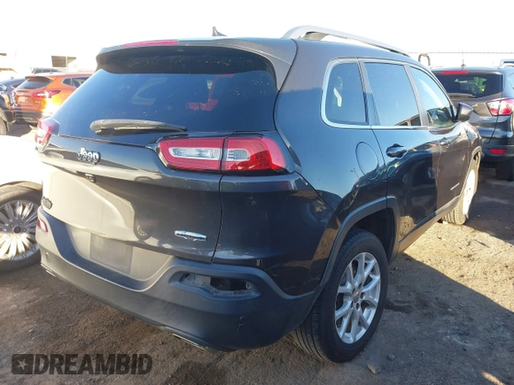 2016 Jeep Cherokee Altitude with VIN 1C4PJLCS8GW173279, listed as a IAAI auction lot 41129117 with 163,978 mi miles. Bid and sale history available at carsss.com. Image 4.