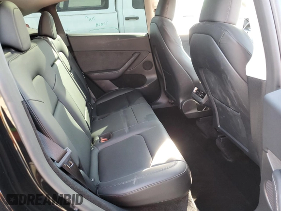 2023 Tesla Model Y Long Range with VIN 7SAYGDEE5PF834645, listed as a Copart auction lot 48596925 with 26,896 mi miles and Salvage Title. Bid and sale history available at DreamBid. Image 11.