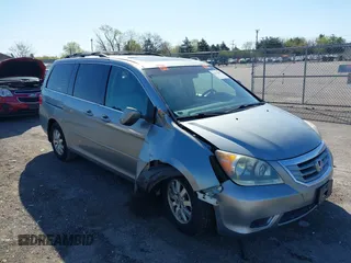 2009 Honda Odyssey EX-L with VIN 5FNRL38729B032786, listed as a IAAI auction lot 42012590 with 188,552 mi miles. Bid and sale history available at carsss.com. Image 1.