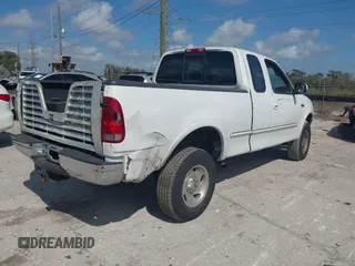 1997 Ford F-150 XL with VIN 1FTDX1868VKA12923, listed as a IAAI auction lot 41526986 with 343,755 mi miles. Bid and sale history available at carsss.com. Image 4.