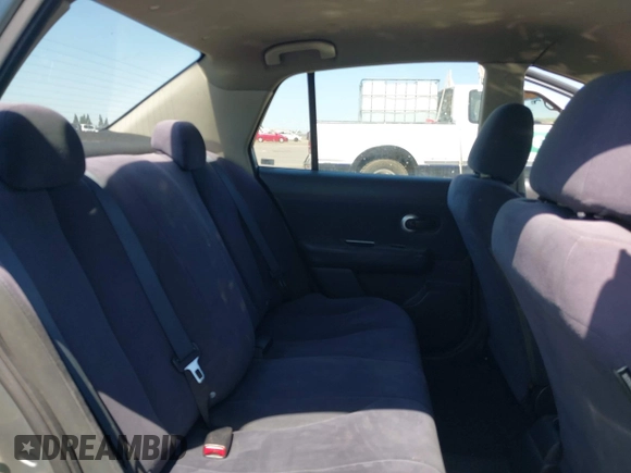 2009 Nissan Versa 1.8 S with VIN 3N1BC11E09L449780, listed as a IAAI auction lot 42034977 with 180,680 mi miles. Bid and sale history available at carsss.com. Image 8.