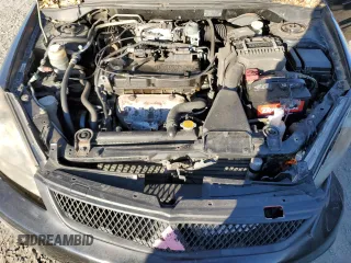 2006 Mitsubishi Lancer OZ-Rally with VIN JA3AJ86E16U059013, listed as a Copart auction lot 80056014 with 107,179 mi miles and Clean Title. Bid and sale history available at DreamBid. Image 11.
