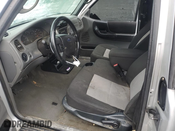 2010 Ford Ranger XLT with VIN 1FTKR4EEXAPA44803, listed as a Copart auction lot 55351865 with 98,774 mi miles and Salvage title. Bid and sale history available at DreamBid. Image 7.