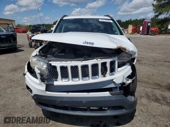 2014 Jeep Compass Sport with VIN 1C4NJCBA5ED844934, listed as a Copart auction lot 52774945 with 148,897 mi miles and Salvage Title. Bid and sale history available at carsss.com. Image 5.
