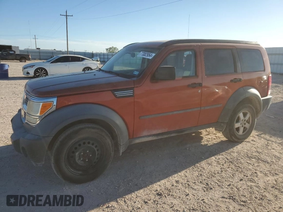 2007 Dodge Nitro SXT with VIN 1D8GU28K87W728744, listed as a Copart auction lot 77082954 with 245,632 mi miles and Salvage title. Bid and sale history available at DreamBid. Image 1.