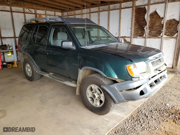 2000 Nissan Xterra XE with VIN 5N1ED28Y8YC567126, listed as a Copart auction lot 43042455 with 91,751 mi miles and Salvage Title. Bid and sale history available at carsss.com. Image 4.
